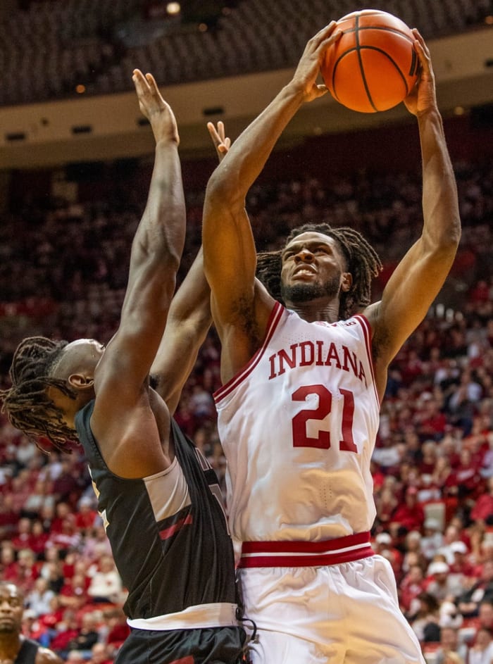 Indiana's Mackenzie Mgbako (21) shoots during the Indiana versus University of Indianapolis men's basketball game.